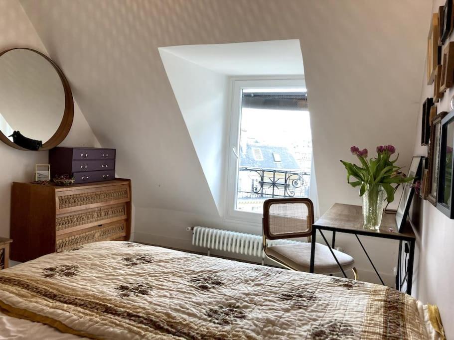 Appartement Cosy Dans Le 9E Paris Bagian luar foto